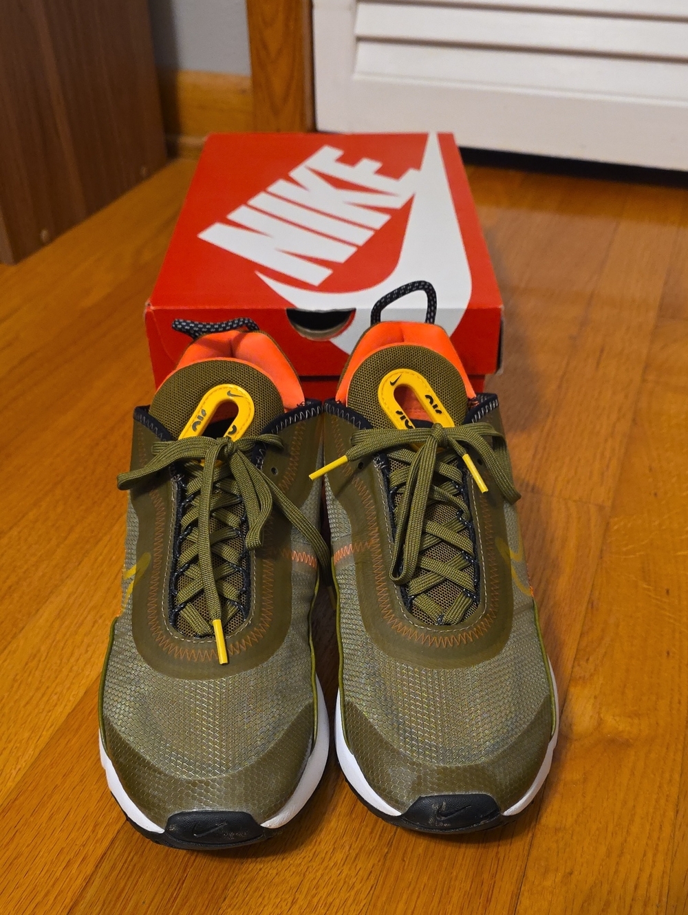 Nike Men/womens  Olive Green Running Shoes with Orange Accents.